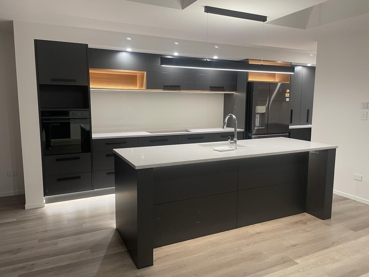 Dark designer kitchen with island
